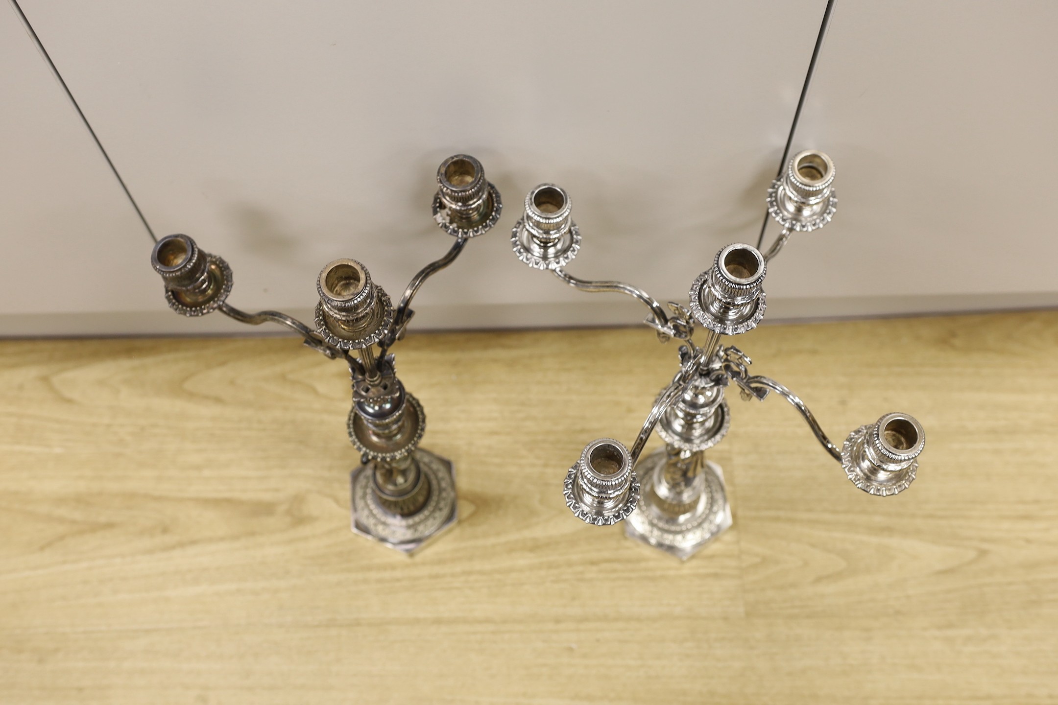 A pair of Elkington silver plated figural candelabra, 48.5 cms high